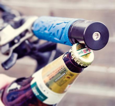 A Bottle Opener That Attaches To Your Bike’s Handlebars