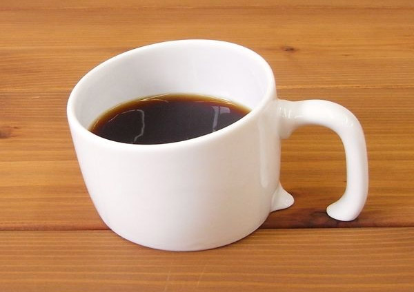 Sinking Into Table Coffee Mug