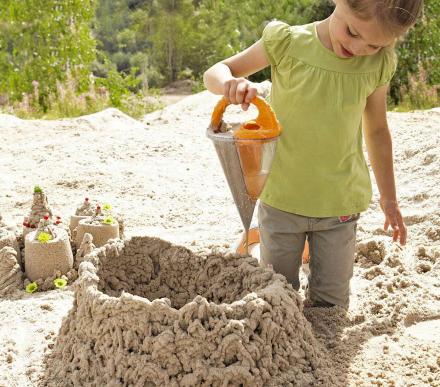 This Sand Funnel Mixes Water and Sand To Create Sand Structures