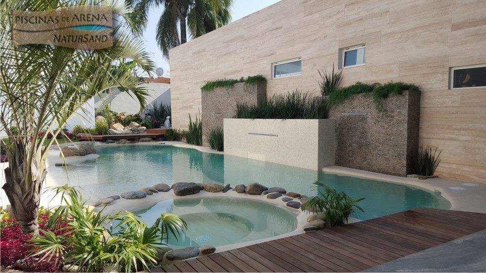 Beach entry walk in pools made from real sand