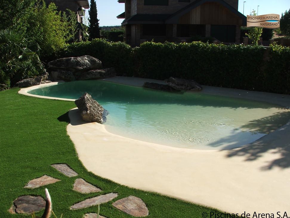 Beach entry walk in pools made from real sand
