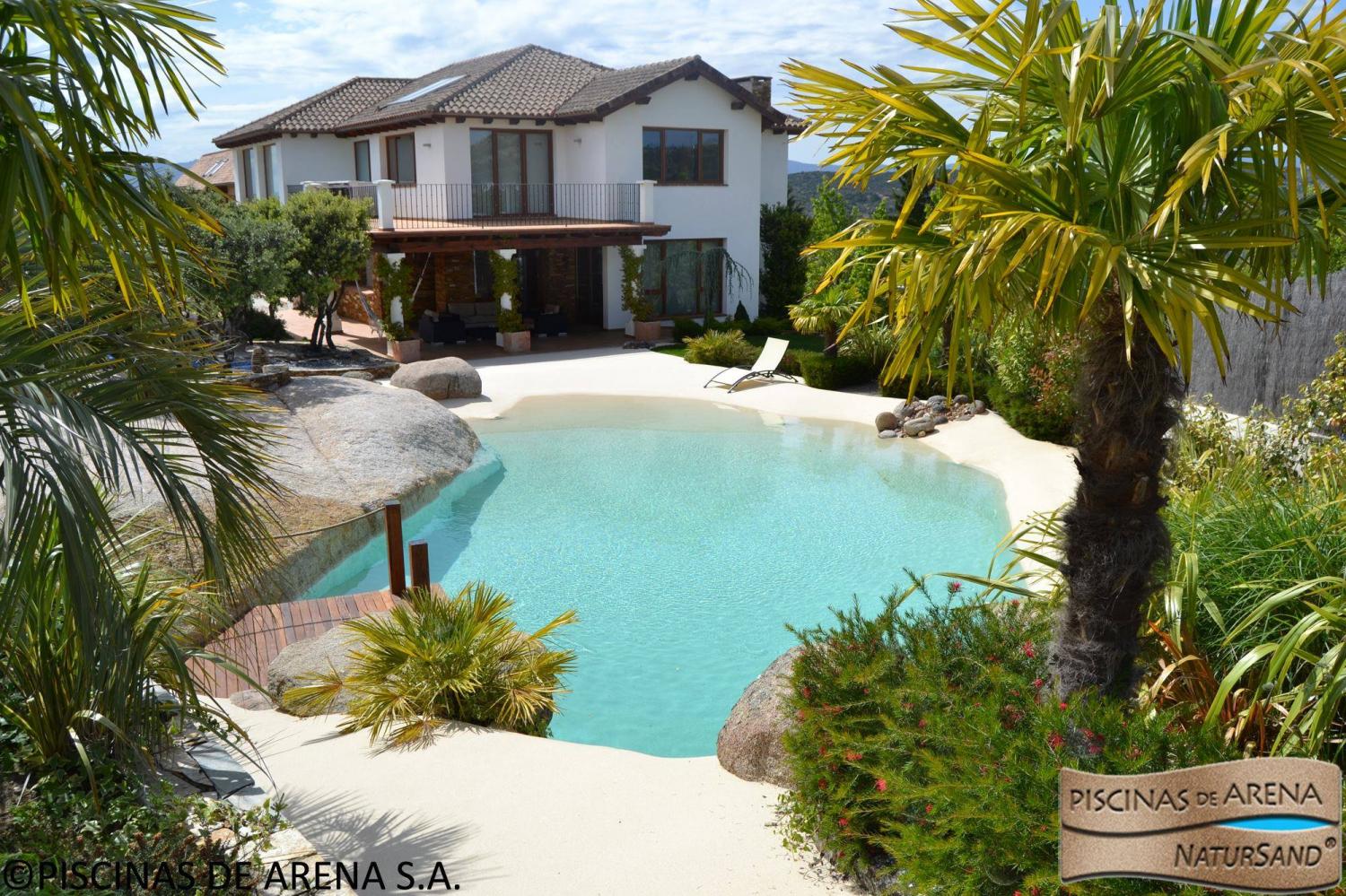 Beach entry walk in pools made from real sand