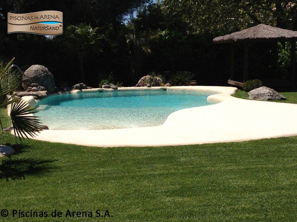 Beach entry walk in pools made from real sand