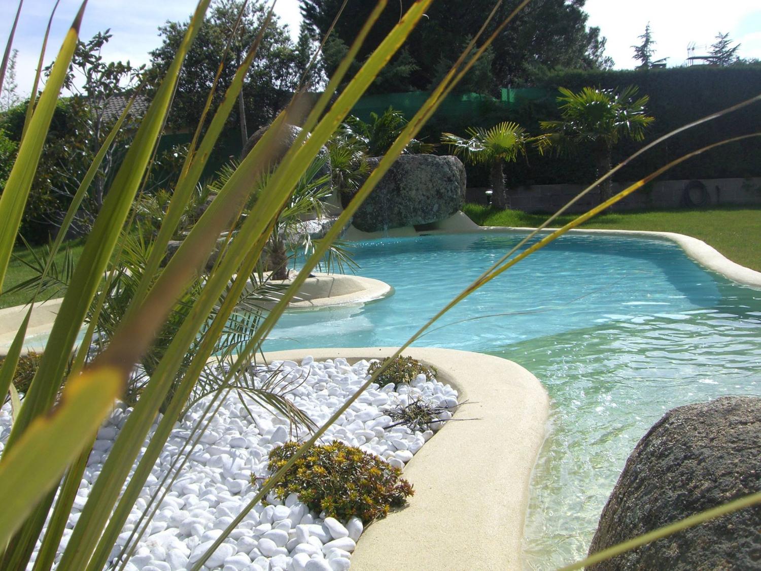 Beach entry walk in pools made from real sand