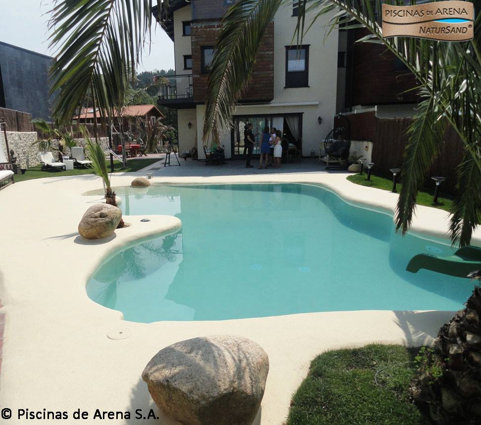 Beach entry walk in pools made from real sand