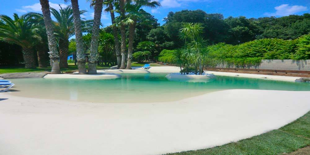 Beach entry walk in pools made from real sand