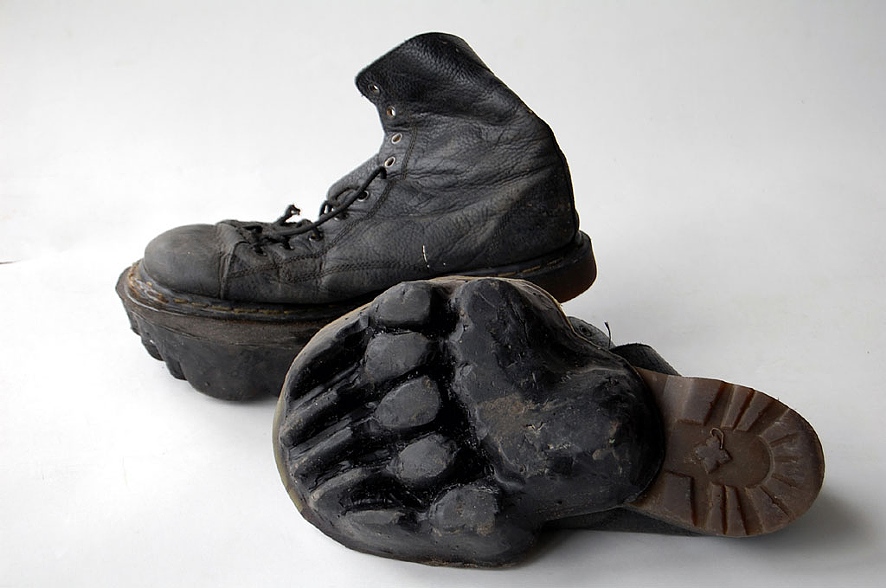 Animal footprint shoes leave behind deer and bear tracks in snow