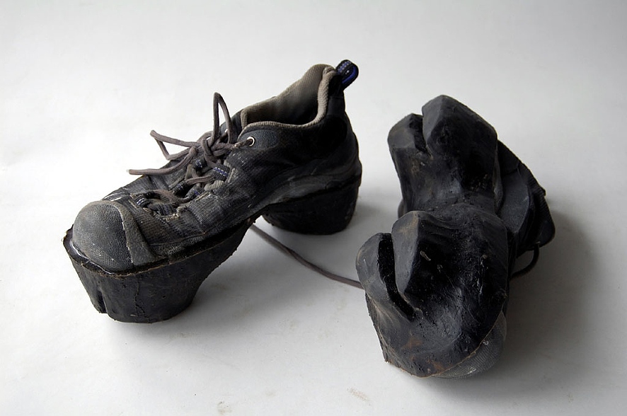 Animal footprint shoes leave behind deer and bear tracks in snow