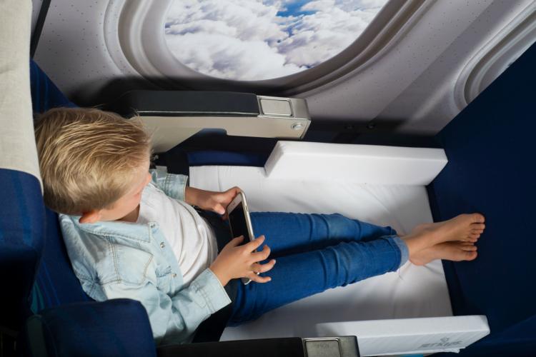 BedBox Rideable Child Luggage - Kids Carry-on acts as plane seat bed