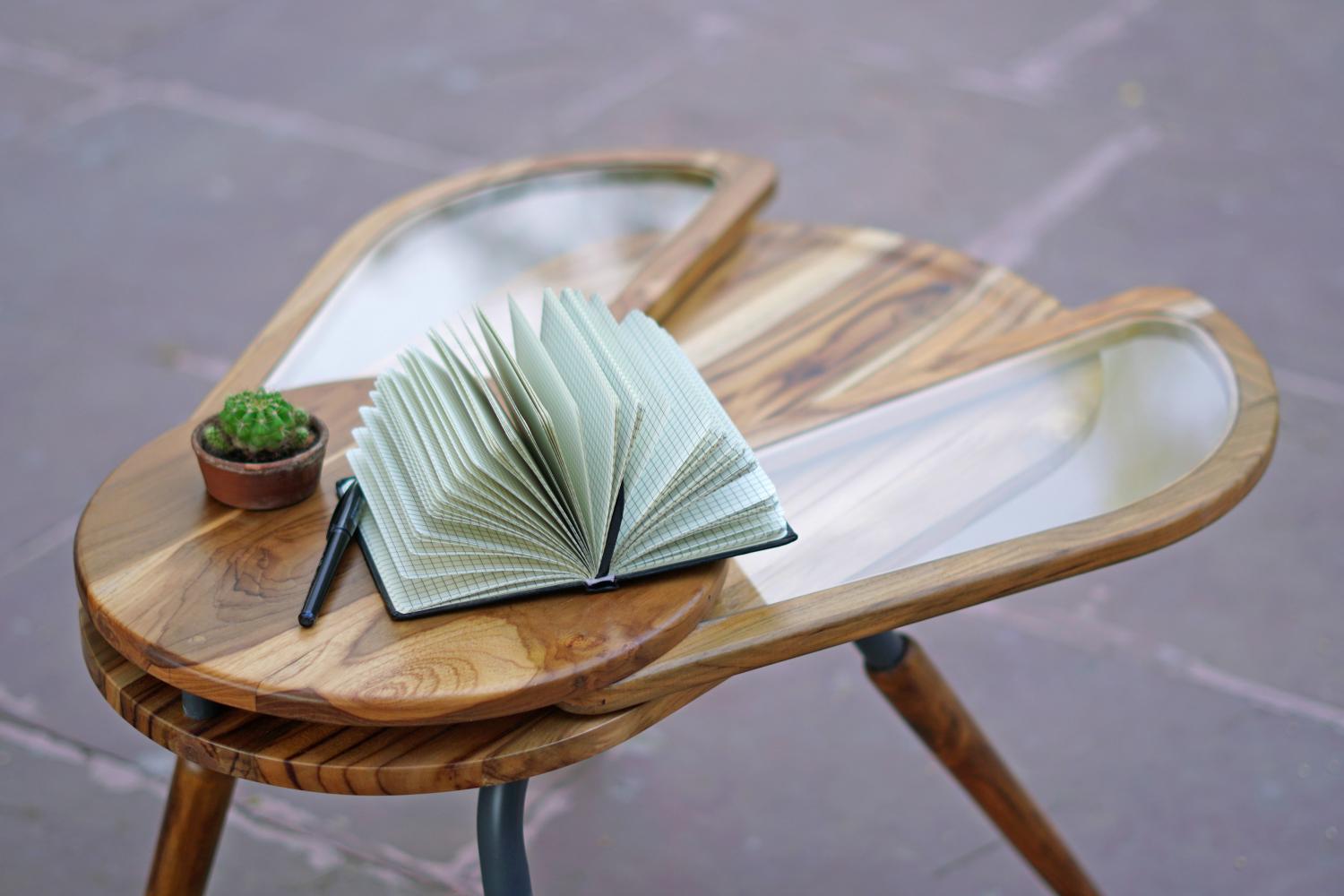 Beetle Inspired Coffee Table Has Wings That Spread Out To Increase Surface Area - Elytra extending coffee table