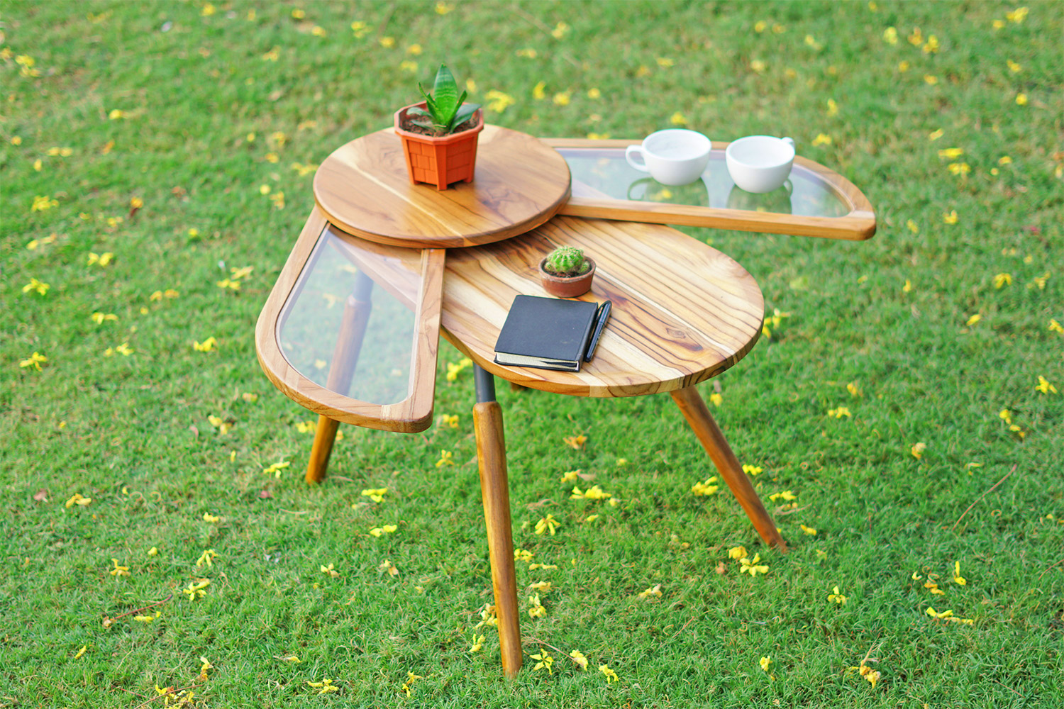 Beetle Inspired Coffee Table Has Wings That Spread Out To Increase Surface Area - Elytra extending coffee table