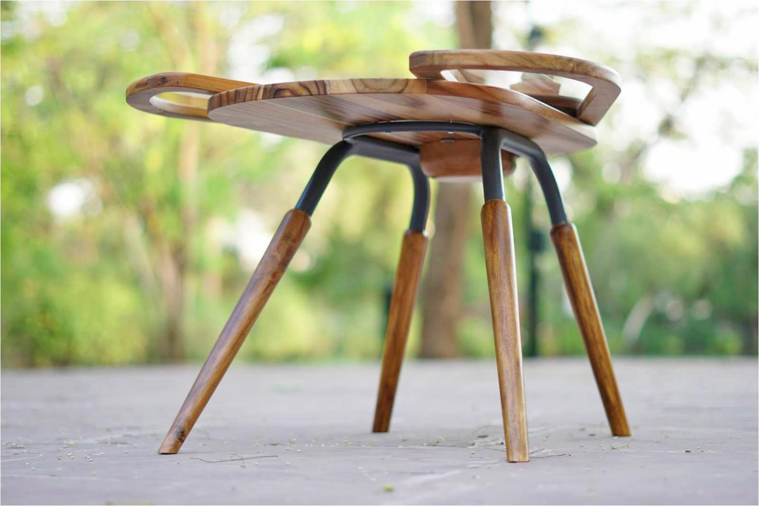 Beetle Inspired Coffee Table Has Wings That Spread Out To Increase Surface Area - Elytra extending coffee table