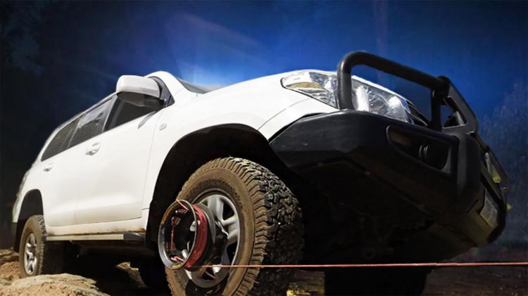 Bush Winch - Winch attaches to your tire - Gets you unstuck form snow, mud, sand - Wheel winch