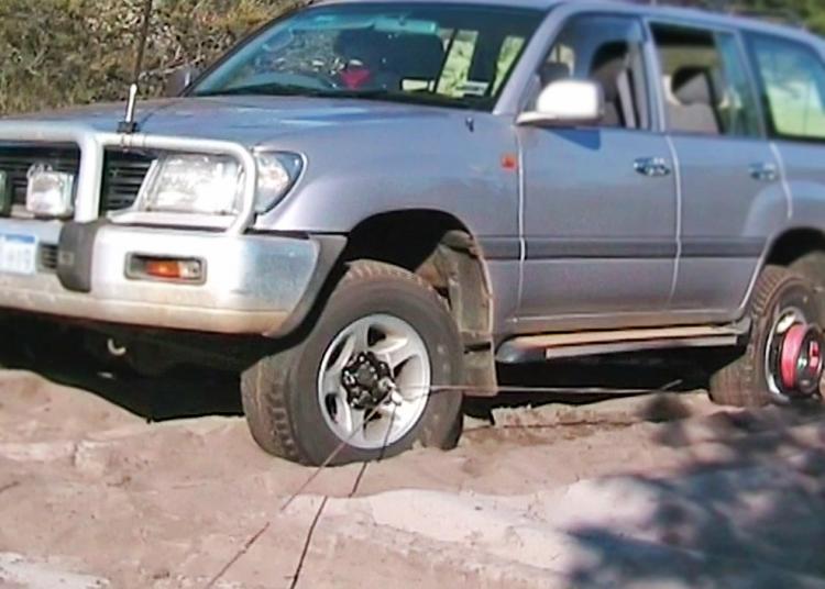 Bush Winch - Winch attaches to your tire - Gets you unstuck form snow, mud, sand - Wheel winch