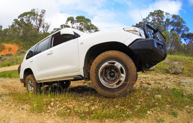 Bush Winch - Winch attaches to your tire - Gets you unstuck form snow, mud, sand - Wheel winch