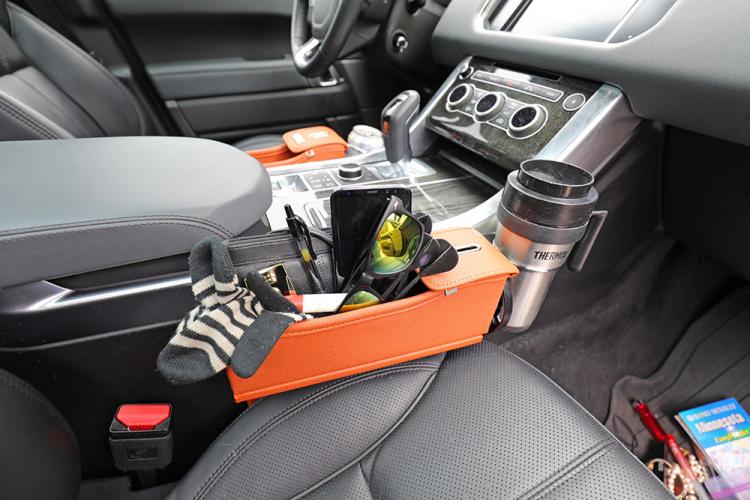 Car Seat Storage Pockets - Pocket between car seat and center console to store items, drinks, and coins