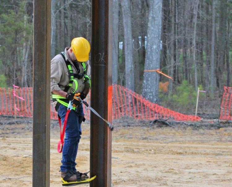 Column Climbers - Unique steel beam climbing shoe attachments - Steel workers climbing tool