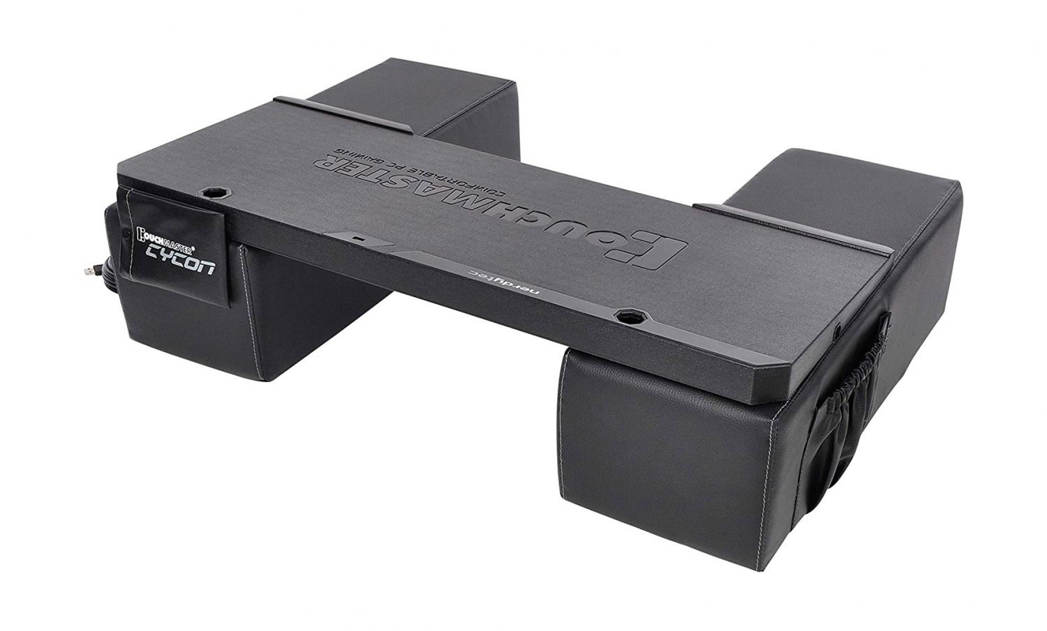 Couchmaster Is a Lap Desk That Creates a Workstation Right On Your Couch - Couch desk with cushion armrests