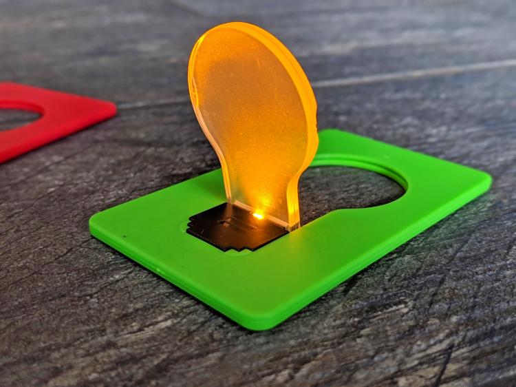 Credit Card Folding Bulb Lamp Fits In Your Wallet