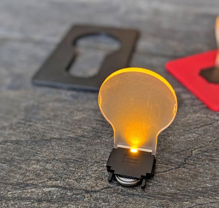 Credit Card Folding Bulb Lamp Fits In Your Wallet