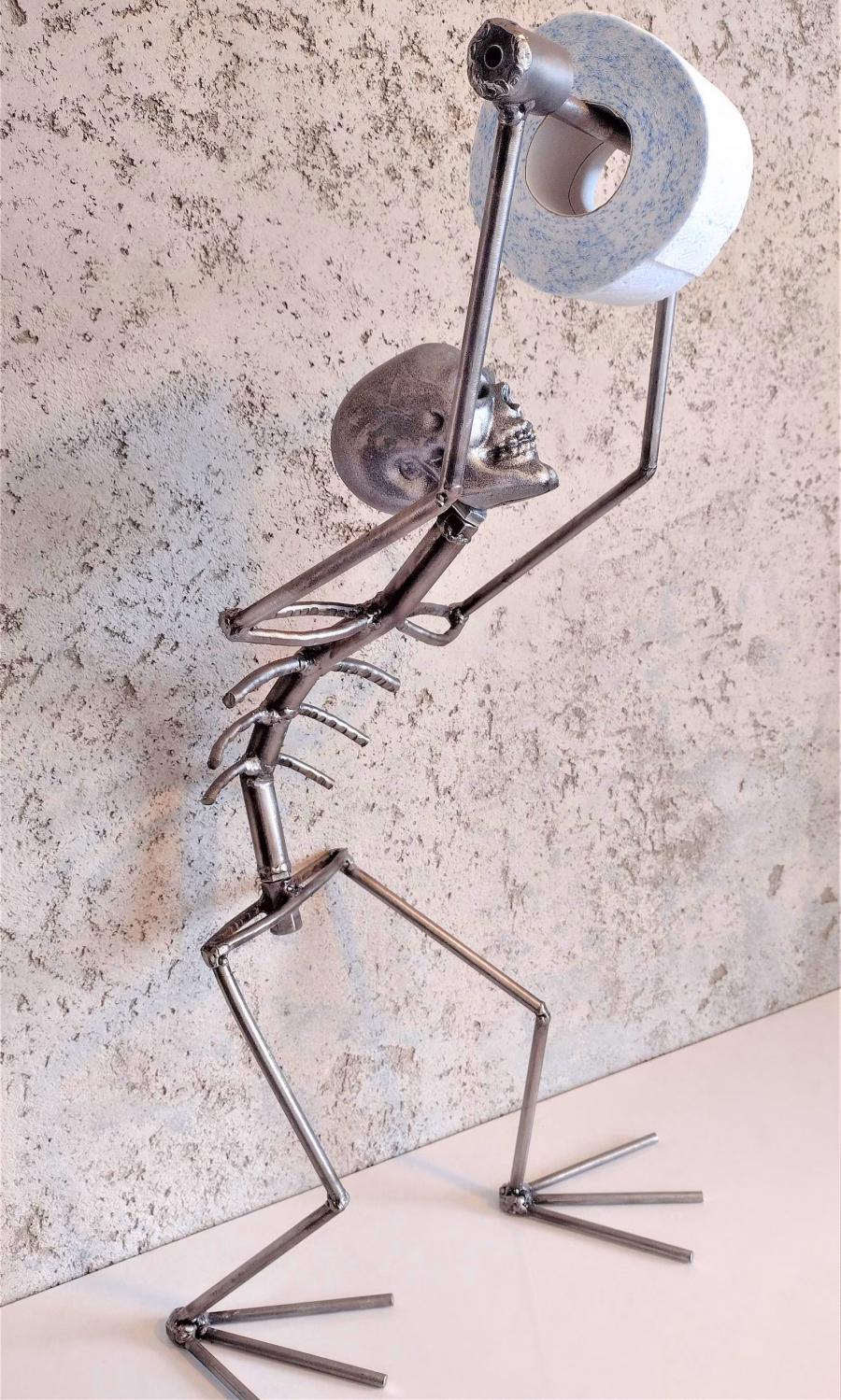 Creepy Metal Skeleton Toilet Paper Holder - your butt napkins my lord