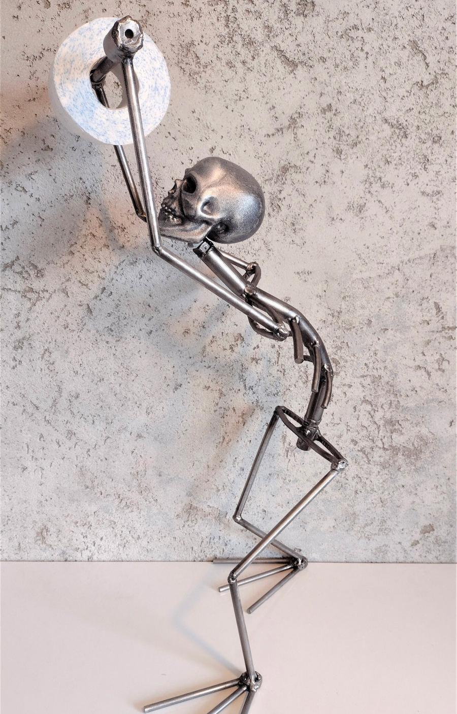 Creepy Metal Skeleton Toilet Paper Holder - your butt napkins my lord