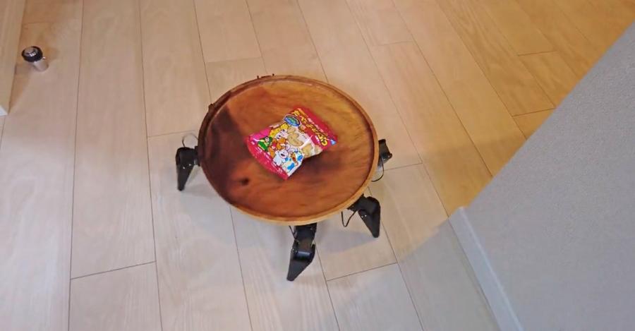 Spider shaped robotic serving plate to serve guests snacks
