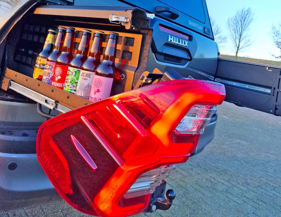 Custom pullout taillight storage drawers for drinks and guns