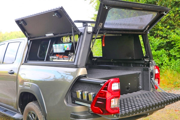 Custom pullout taillight storage drawers for drinks and guns