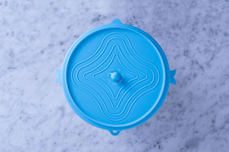 Unilid Stretchy Silicone Universal Leftover Lid - Leftover lid with day of week dial to track how old leftovers are