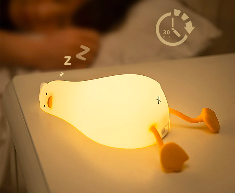 Funny defeated duck lying on stomach night-light - duck in existential crisis lamp
