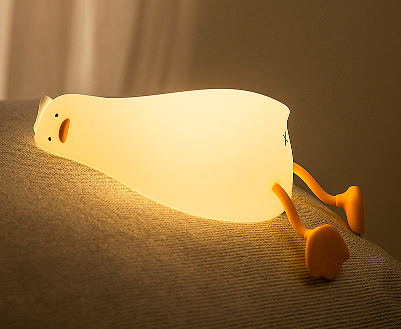 Funny defeated duck lying on stomach night-light - duck in existential crisis lamp