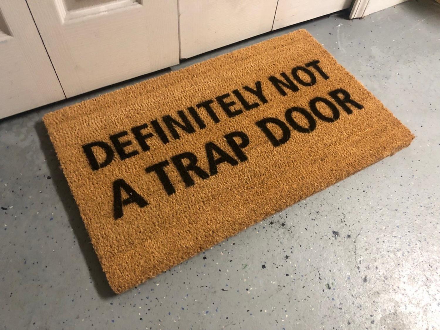 Definitely Not A Trap Door Doormat