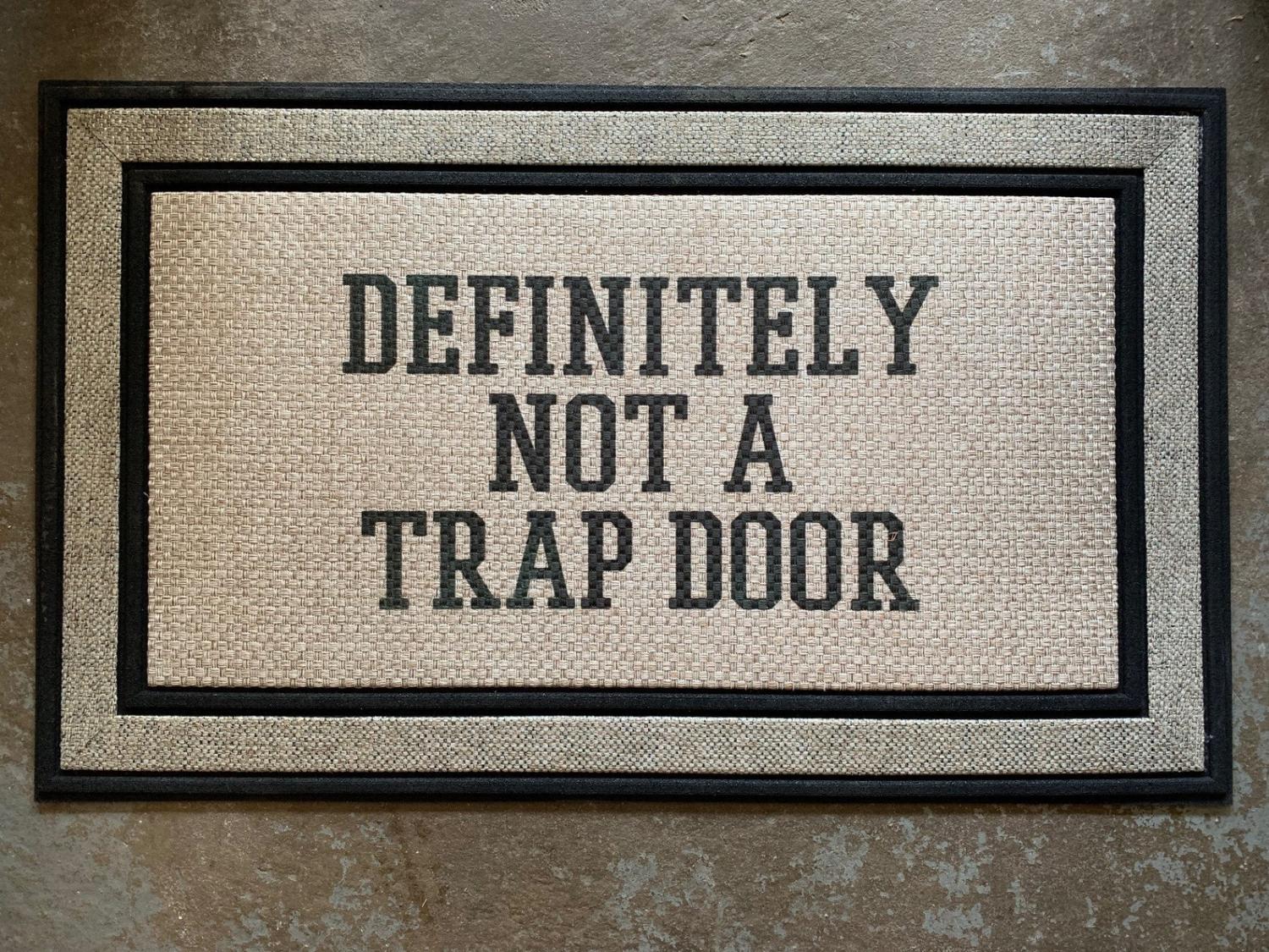 Definitely Not A Trap Door Doormat