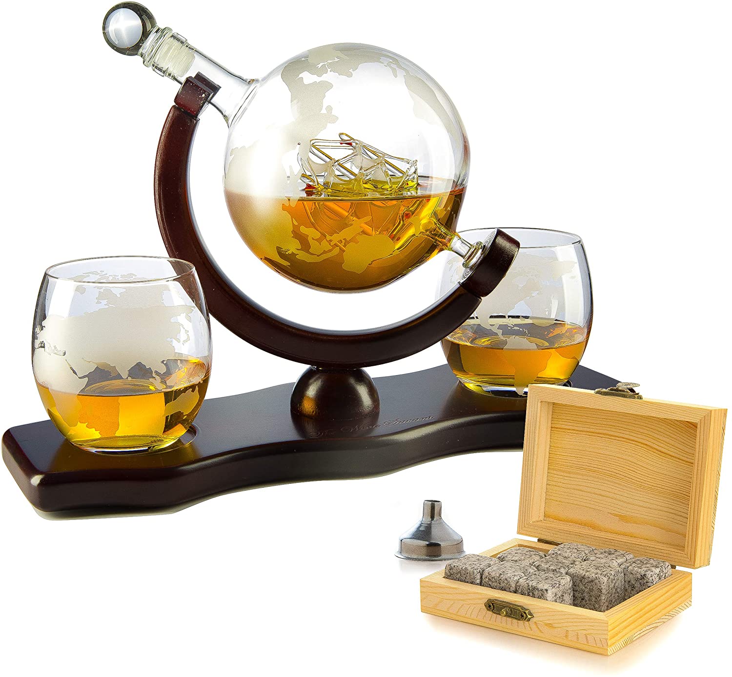 A sail boat inside a glass globe liquor decanter