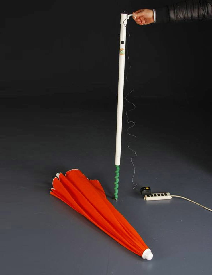 DrillBeach Electric Umbrella Drills Into Sand