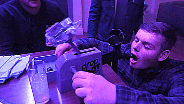 Dropshot drinking game - Russian roulette party game drops a shot in your mouth at random - Hot potato drinking game