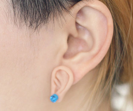 Ear shaped earrings