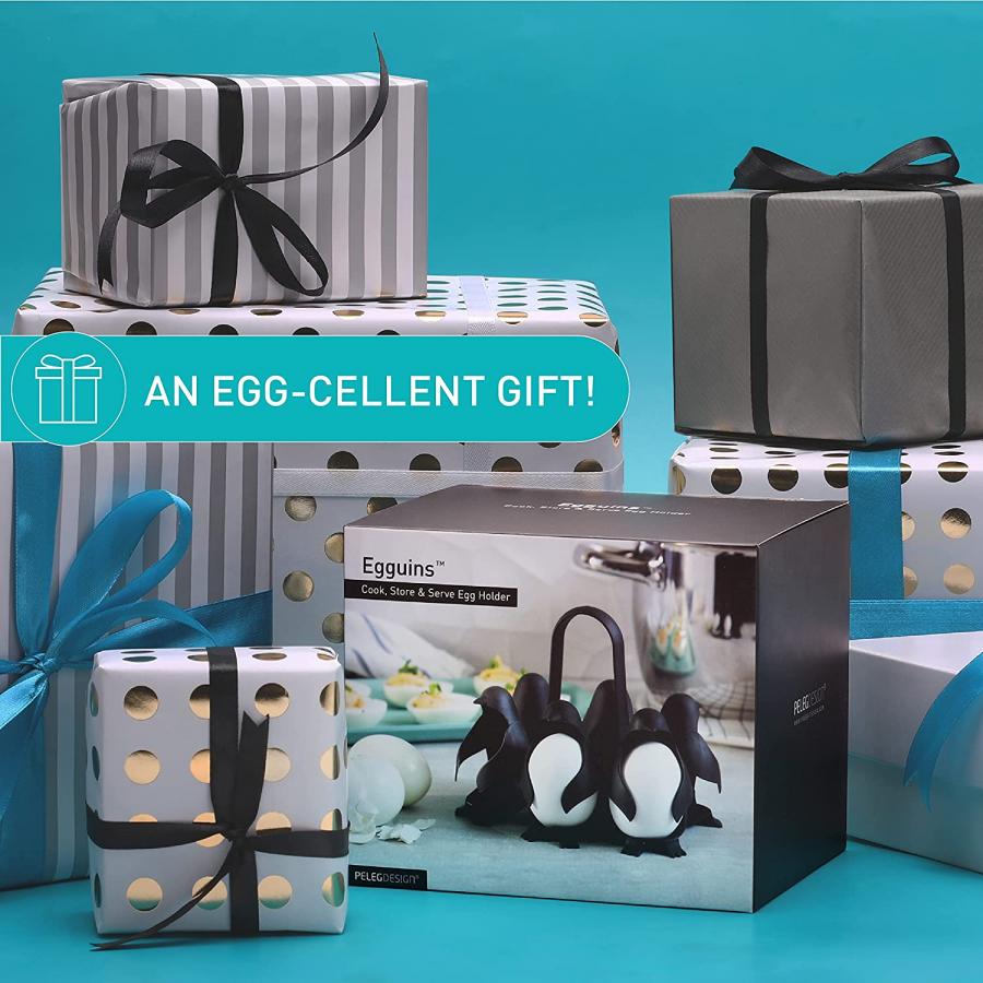 Egguins Penguin egg holders hold eggs under boiling water - penguin shaped egg server