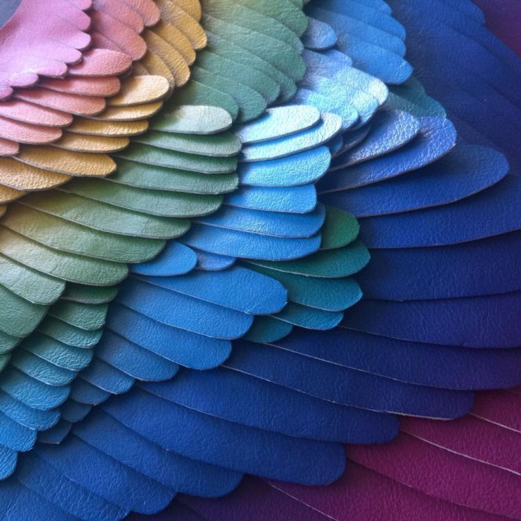 Unique leather backpacks that give you feathery wings - stylish winged backpack