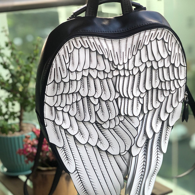 Unique leather backpacks that give you feathery wings - stylish winged backpack
