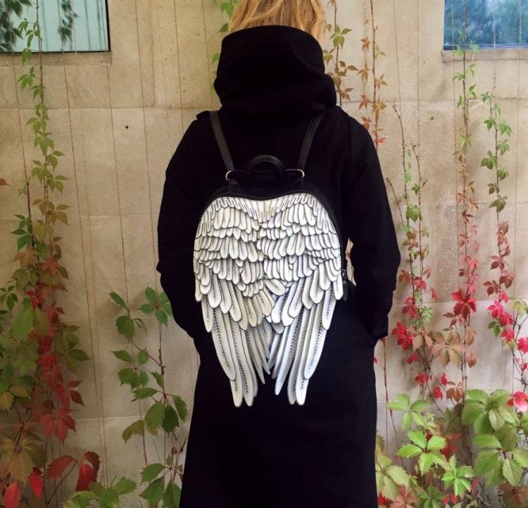 Unique leather backpacks that give you feathery wings - stylish winged backpack