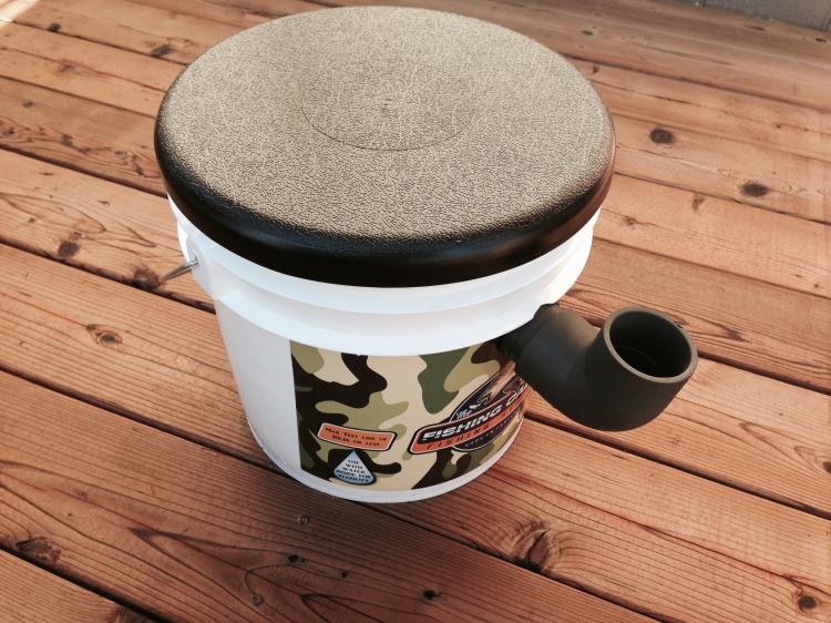 Fishing Caddy bucket combines a seat, tackle-box, and pole holder - Fishing bucket