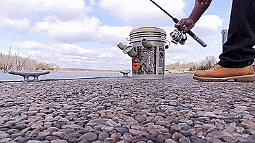 Fishing Caddy bucket combines a seat, tackle-box, and pole holder - Fishing bucket