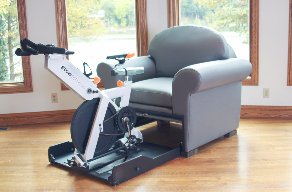 Stow-Away Fitness Equipment That Hides Inside Furniture When Not In Use - folding exercise bike inside armchair