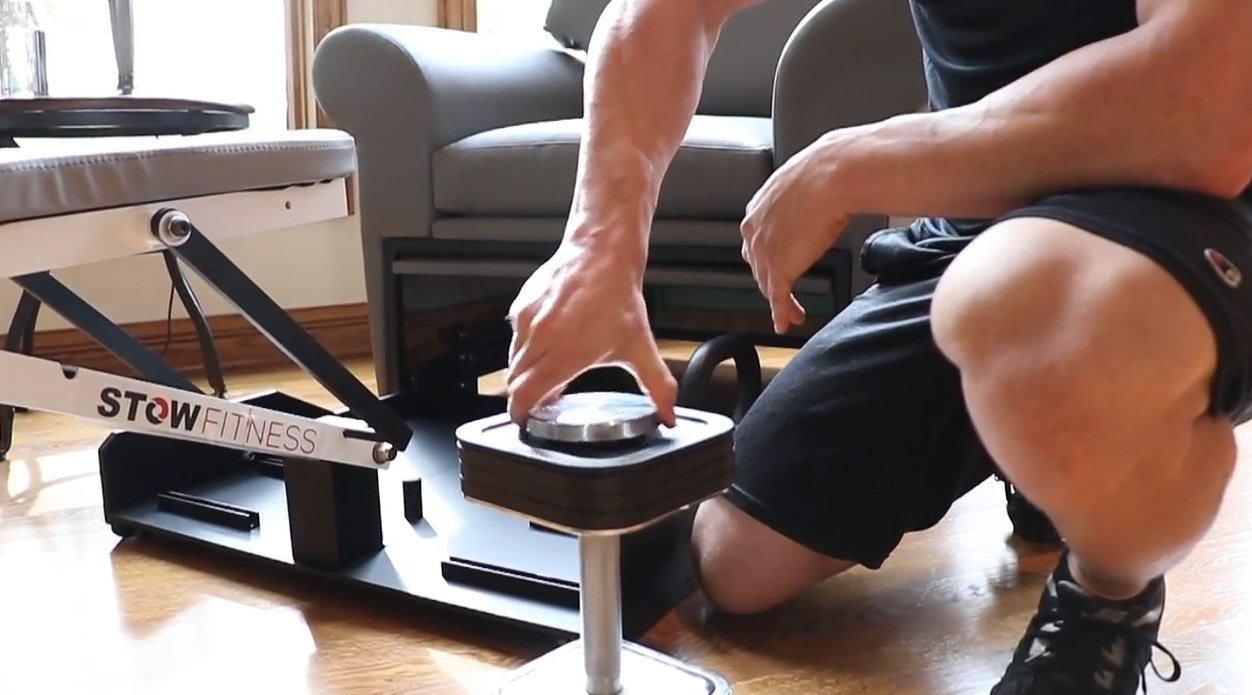 Stow-Away Fitness Equipment That Hides Inside Furniture When Not In Use - folding exercise bike inside armchair