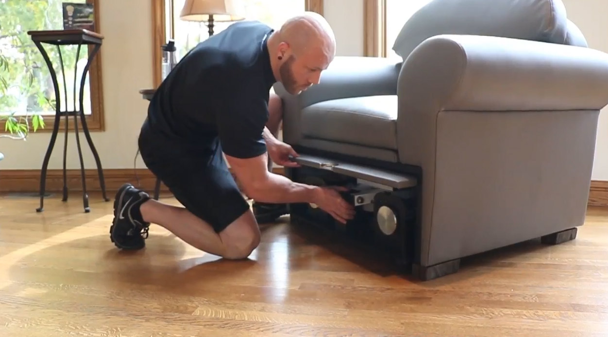 Stow-Away Fitness Equipment That Hides Inside Furniture When Not In Use - folding exercise bike inside armchair