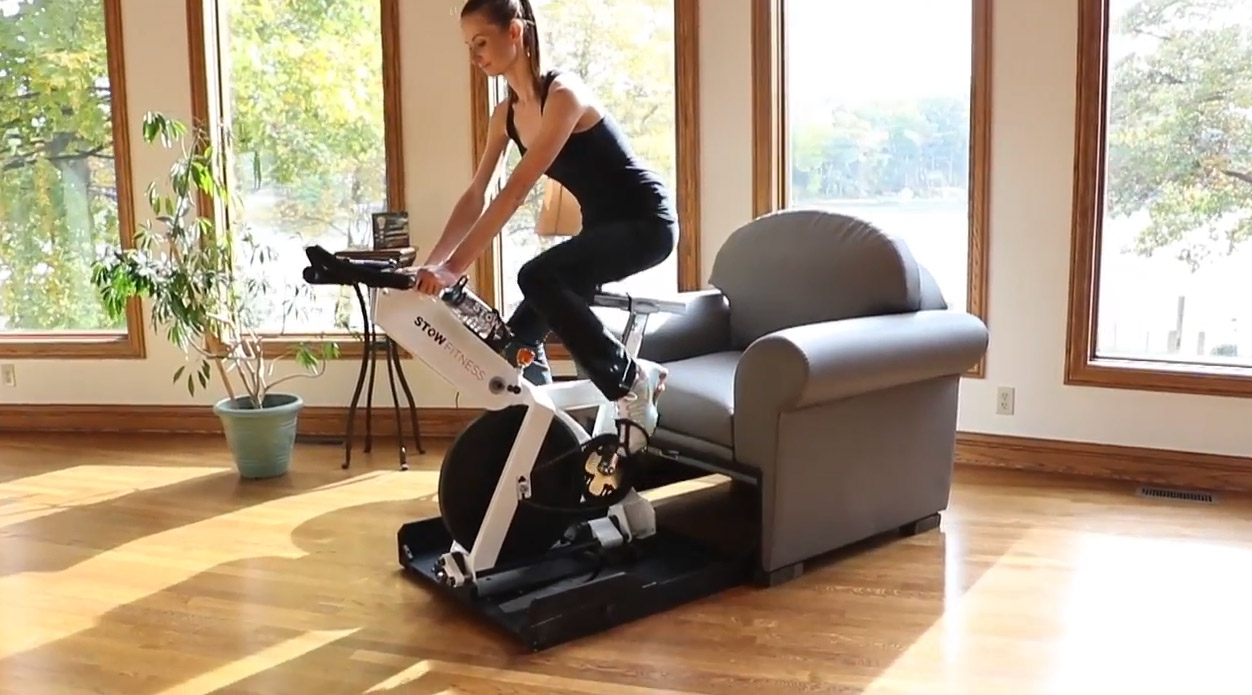 Stow-Away Fitness Equipment That Hides Inside Furniture When Not In Use - folding exercise bike inside armchair
