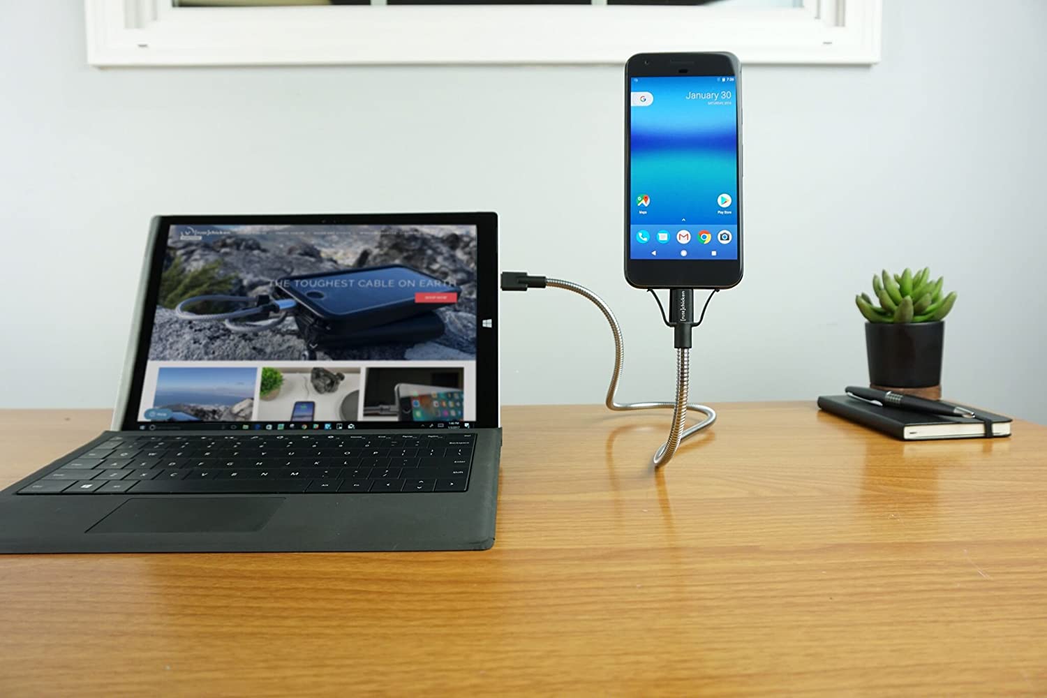 Flexible iPhone Stand and Charger - Rugged Stainless steel charging cable doubles as a phone mount
