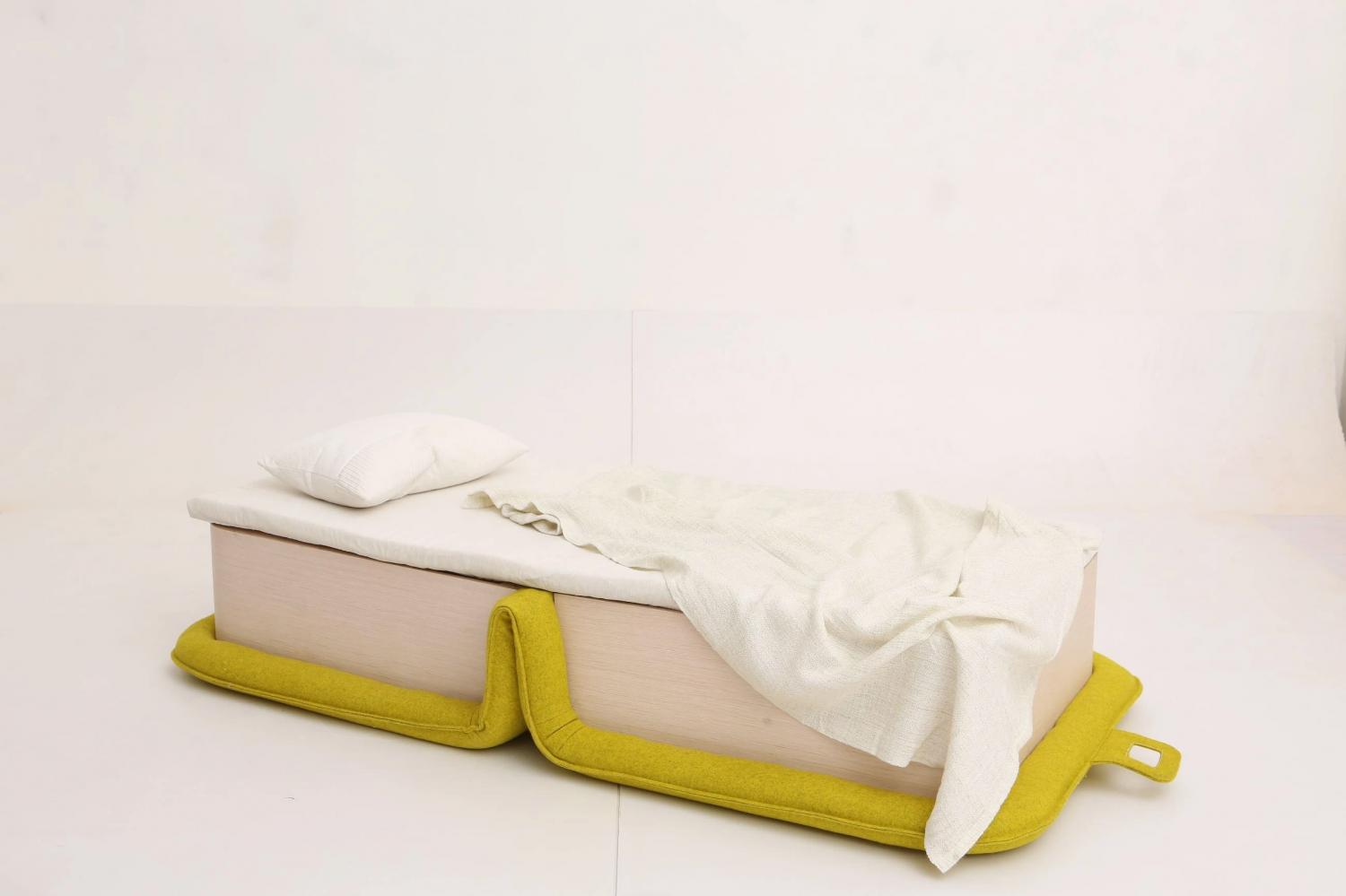 FLOP Multi-functional Arm Chair Instantly Turns Into a Bed - Folding chair bed opens like a book